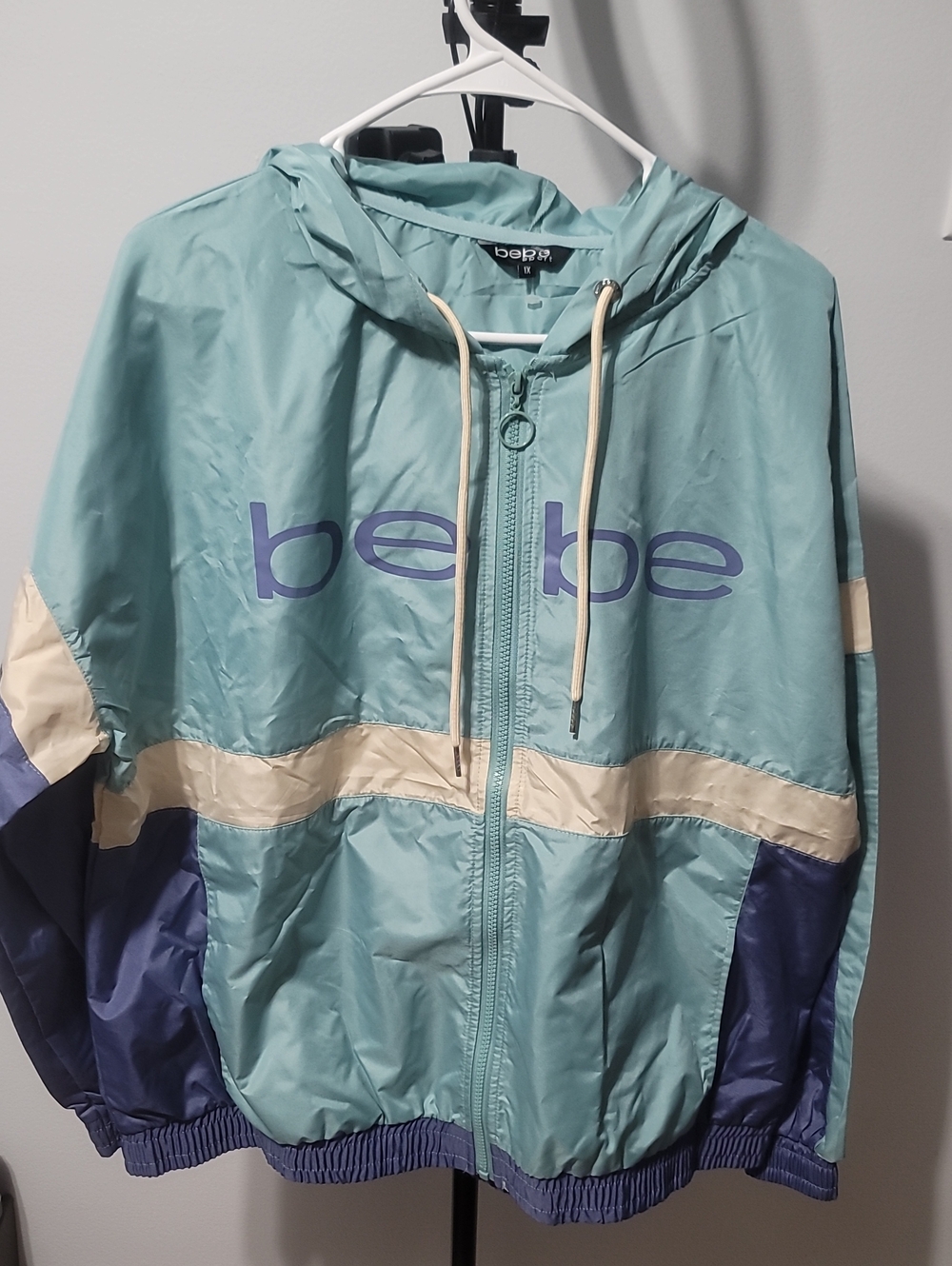 bebe Teal and Navy Colorblock Hooded Bomber Jacket with Cream Accents
